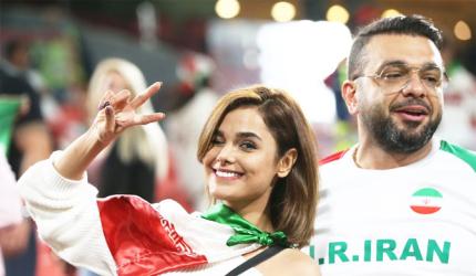 PHOTOS: Fans turn up the buzz at Asian Cup football!