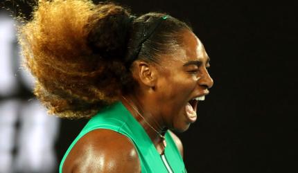 Aus Open PIX: Serena, Djokovic advance; Raonic overcomes Wawrinka
