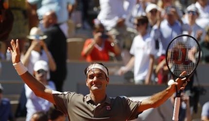 French Open PIX: Federer, Nadal waltz into last 8