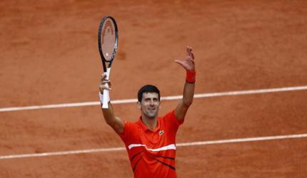 PIX: Djokovic, Thiem to meet in SF; Anisimova stuns Halep