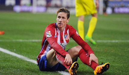 Soccer Extras: Spain striker Torres retires