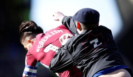 Pitch invasions raise fears for player safety