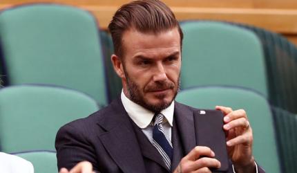 Beckham gets six-month driving ban for using phone