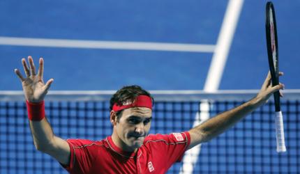 Federer ousts Tsitsipas for 50th win of the season