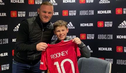 Wayne Rooney's son Kai signs for Manchester United