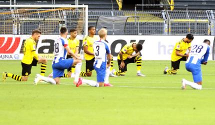 Dortmund players kneel in tribute to George Floyd