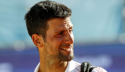 PIX: Tearful Djokovic knocked out of own event