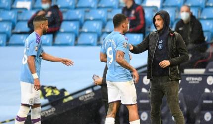 Man City: Guardiola concedes defeat in title race 