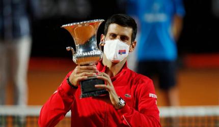 Djokovic wins 5th Italian Open, makes Masters history