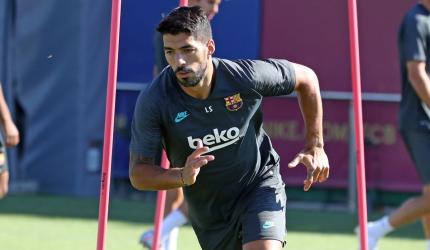 Suarez joins Atletico from Barcelona; Di Maria banned