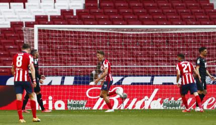 Soccer PIX: Real drop points at Getafe; Juve lose