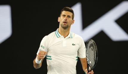 Aus Open PIX: Nole, Halep advance; Thiem stunned