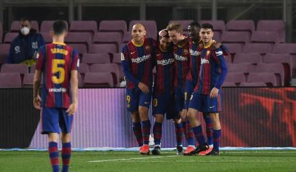 Messi double helps Barca see off Elche