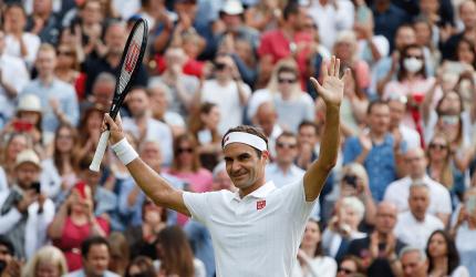 Wimbledon PICS:  Federer, Medvedev, Barty advance