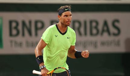 Birthday boy Nadal produces masterclass to advance