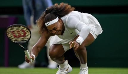 Wimbledon defends 'slippery' courts