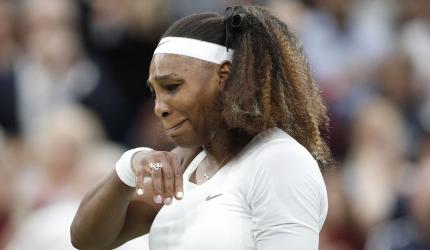 PIX: Wimbledon ends in tears for injured Serena