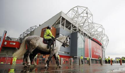 Liverpool arrive at Old Trafford amid fan protest