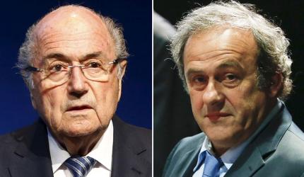 Swiss authorities charge Blatter, Platini with fraud