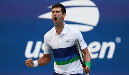 US Open Pix: Djokovic cruises; Rogers stuns Barty