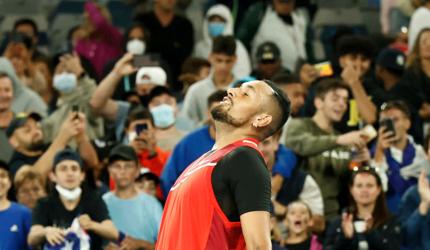 Showman Kyrgios goes from sick-bed to second round