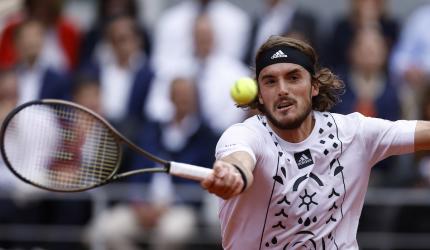 Tsitsipas hits back at critics after grasscourt title