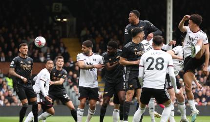 EPL PIX: Arsenal top table; Manchester Utd held 