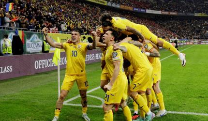 Euro qualifiers: Romania clinch top spot; France held