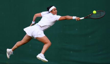 Wimbledon PIX: Defending champ Vondrousova dumped out