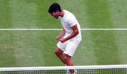 Wimbledon PIX: Alcaraz, Sinner ease into quarters