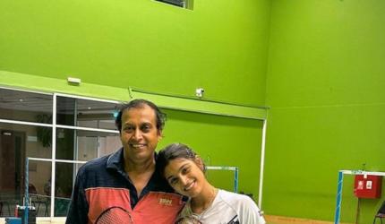 Sacrifices pay off for parents of Olympic shuttlers