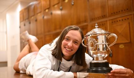 'Queen of clay' Iga wears her perfectionism with pride