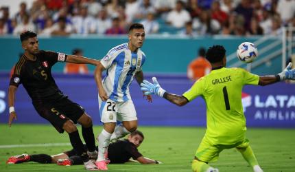Copa America PIX: Argentina beat Peru, top Group A