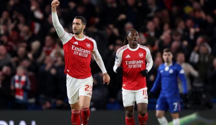 EPL PIX: Arsenal tighten title grip; Chelsea stumble