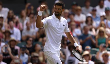Wimbledon: Vintage Djokovic decimates local hope Evans