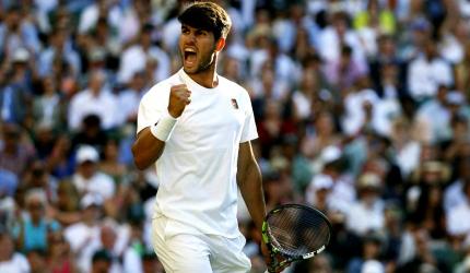 Wimbledon PIX: Alcaraz cruises; Sabalenka survives