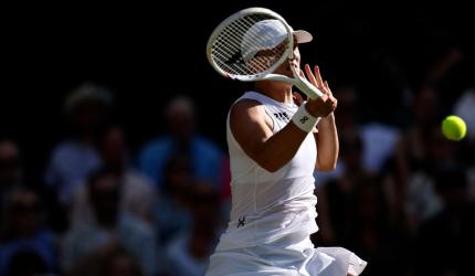 Swiatek to face resilient Anisimova for Wimbledon glory