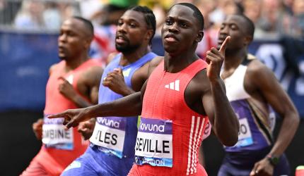 Seville Edges Olympic Champ Lyles For 100m Title
