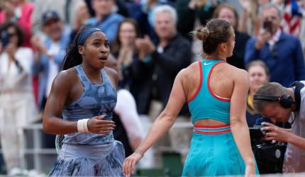 Gauff stuns No1 for French Open win-then drops trophy lid