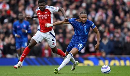 EPL: Arsenal edge Chelsea to keep title hopes alive
