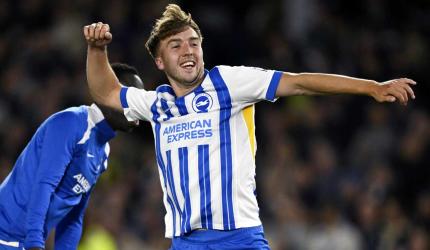Brighton come from behind to shock champions Liverpool
