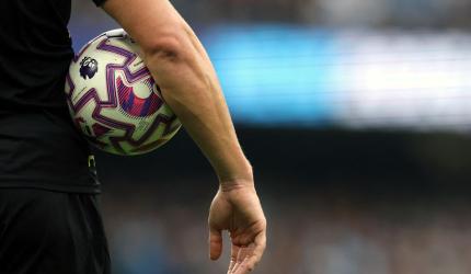 Agent threatened footballer with a gun in UK