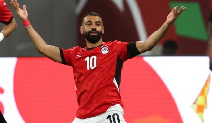 Slot welcomes Salah back after public spat