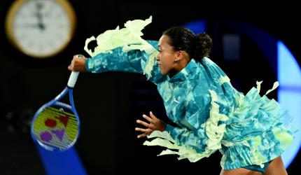 Osaka turns Rod Laver into a runway, battles into round 2