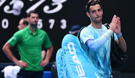 Two sets down, Djokovic saved by Musetti injury