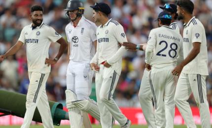 PIX: Rain halts England charge, India live another day