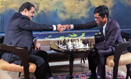 Praggnanandhaa plays chess with Gautam Adani