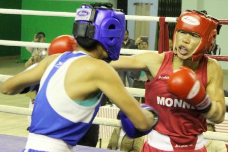 Asian Boxing: Pooja strikes gold; Mary signs off with silver - Rediff.com