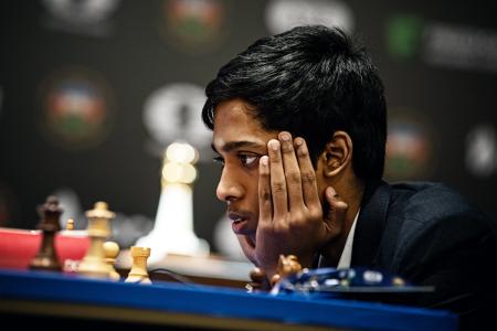 Praggnanandhaa loses to Carlsen in Chess World Cup final - Rediff.com