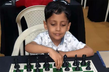 The world's youngest ever chess International Master and his sister -  Rediff.com